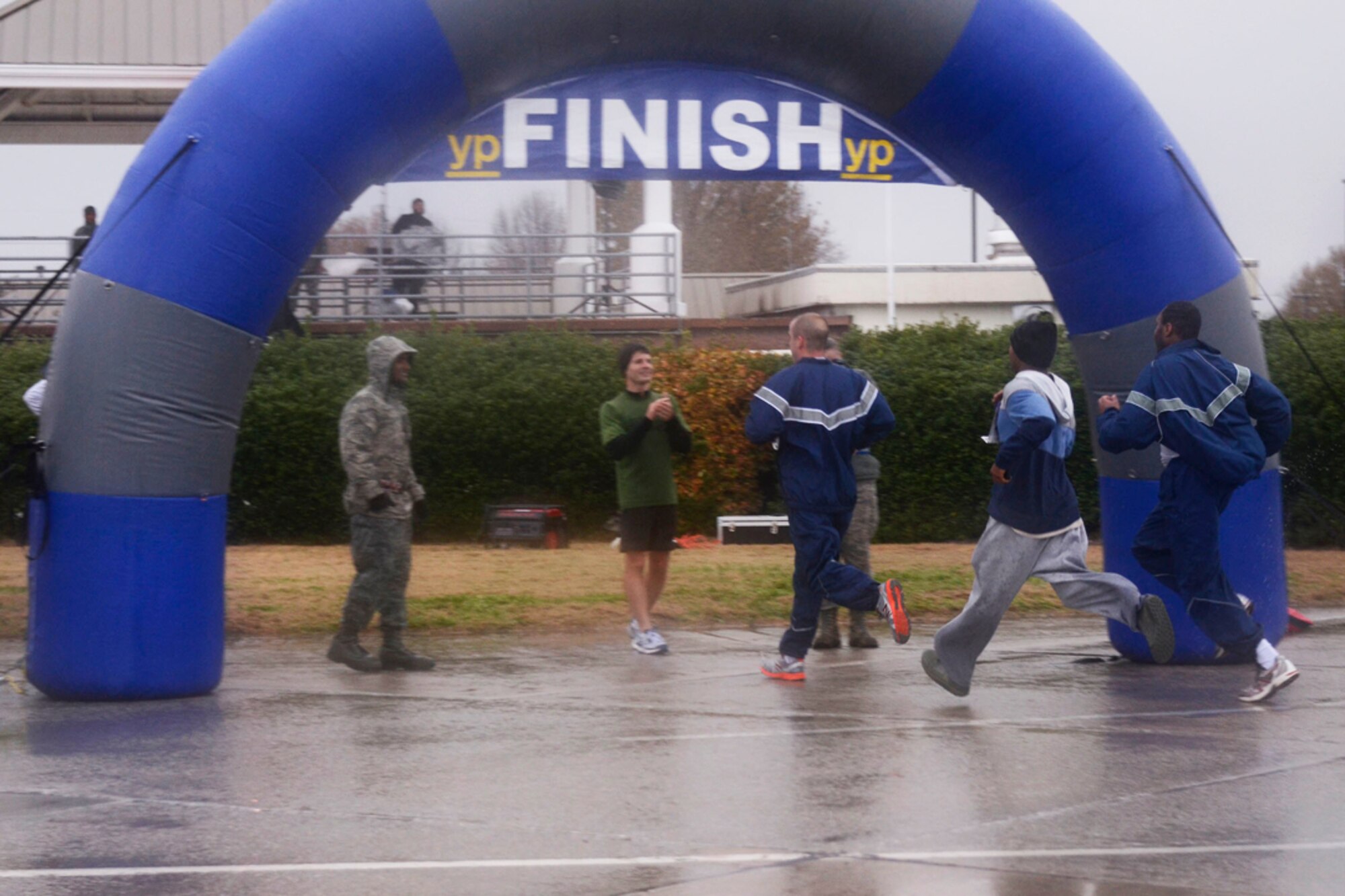 Over 190 94th Airlift Wing members participate in the first annual Falcon 5K, a five kilometer fun-run, Dec. 8, 2013. Sponsored by the Dobbins Top 3, proceeds from the event go to the Dobbins Emergency Fund used for assisting Airmen in times of need. (U.S.Air Force photo/Senior Airman Elizabeth Van Patten)