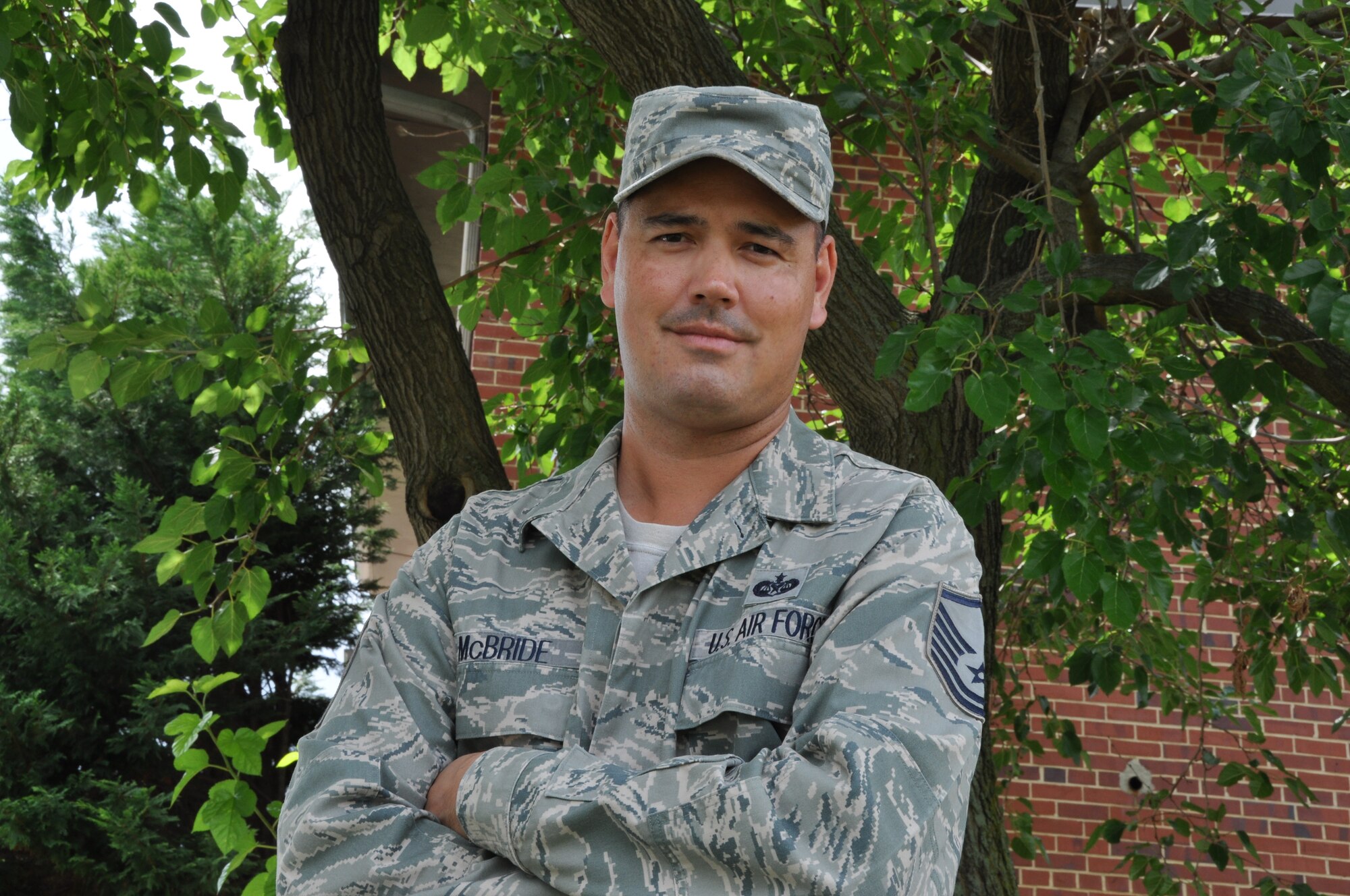 Master Sgt. Lonnie McBride, law office superintendent, Judge Advocate General’s office, demonstrated heroic acts by saving members of his community from a burning building, May 19, 2014. McBride will retire in August after 20 years of service. (U.S. Air Force photo/ Staff Sgt. Katie Spencer)