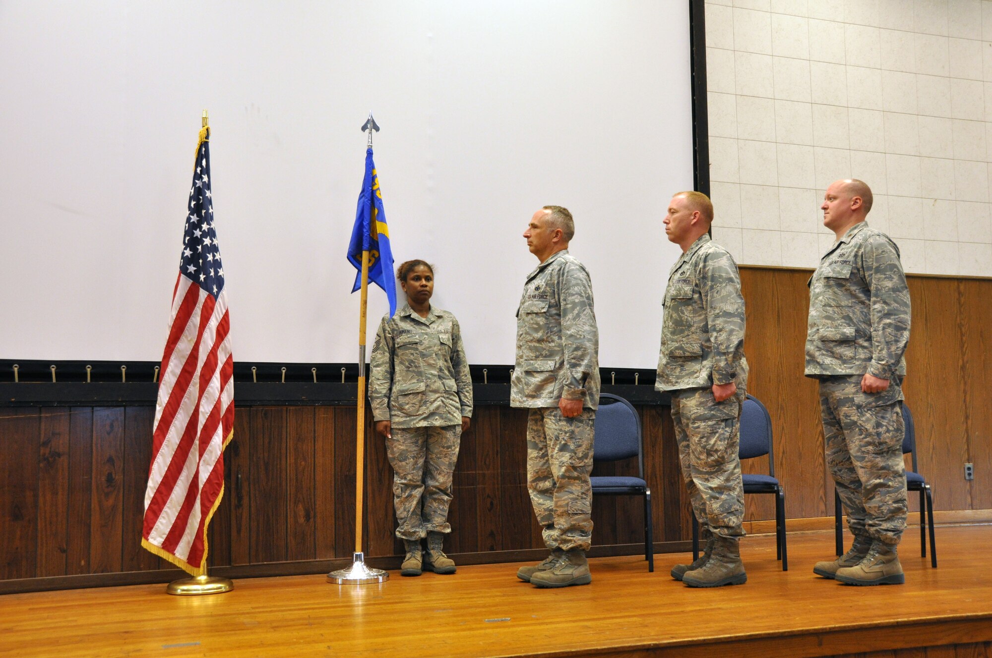 Leadership from the 459th Civil Engineering Squadron stand at attention during a Change of Command Ceremony at Joint Base Andrews, Md., July 19, 2014. Major Luke Stumme assumes command from Lt. Col. Christopher Blanchette. (U.S. Air Force photo/ Staff Sgt. Katie Spencer) 