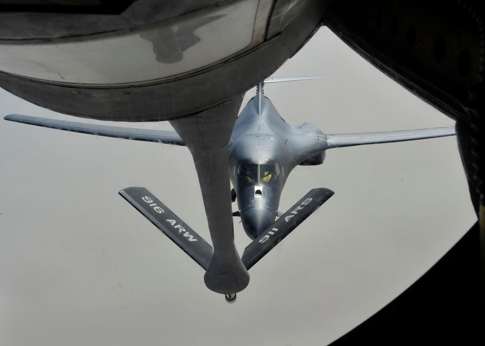 A B-1B Lancer assigned to the 37th Expeditionary Bomb Squadron approaches a KC-135 Stratotanker, assigned to the 340th Expeditionary Air Refueling Squadron both from Al Udeid Air Base, Qatar, fly in support of Operation Enduring Freedom, July 17, 2014. The B-1B Lancer is a four-engine supersonic variable-sweep wing, jet-powered strategic bomber used by the United States Air Force. It was first envisioned in the 1960s as a supersonic bomber with Mach 2 speed. (U.S. Air Force photo by Senior Airman Colin Cates)