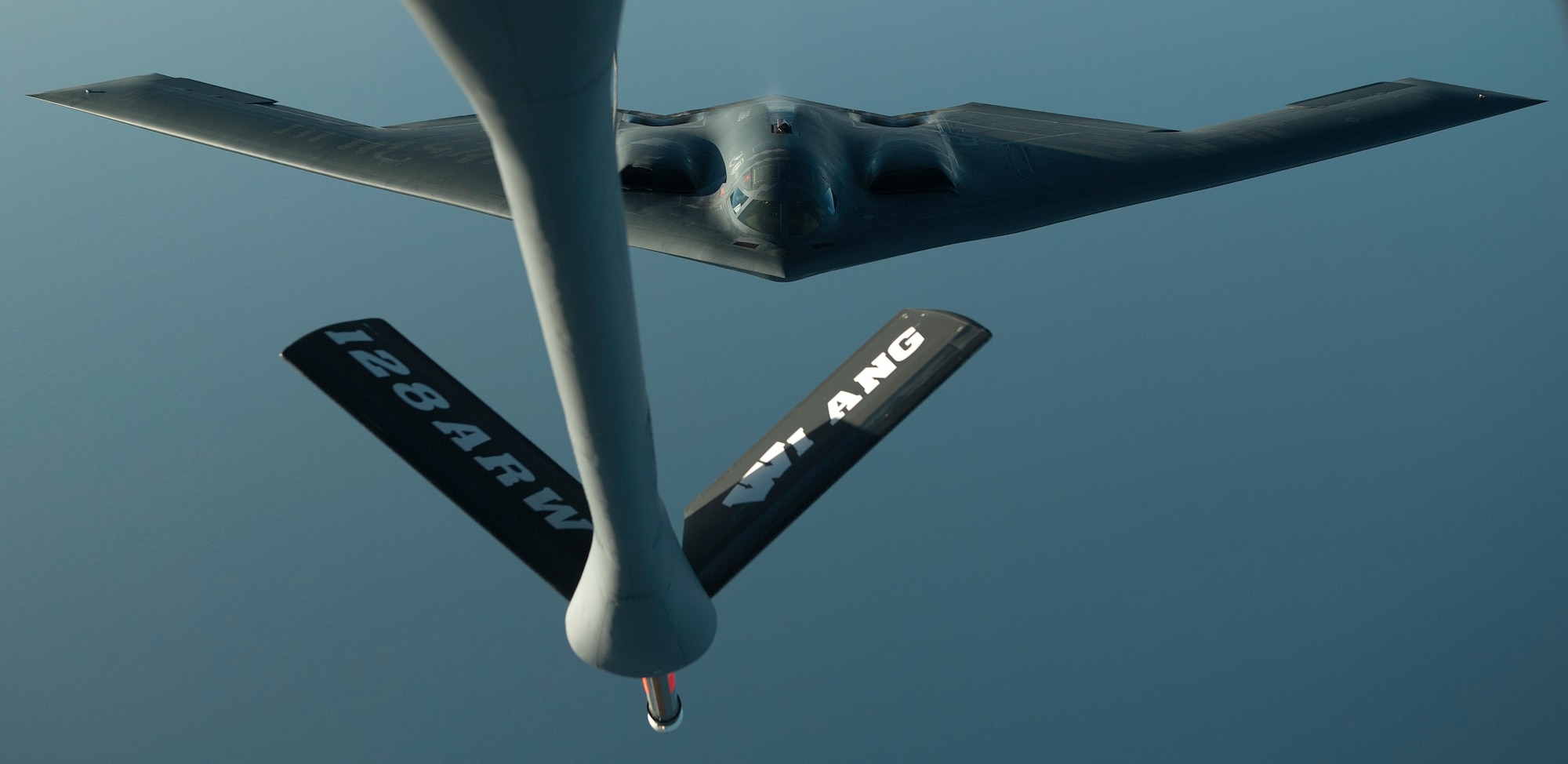 A B-2 Spirit flies into position during a refueling mission over the North Atlantic Ocean June 11, 2014. The B-2 is conducting training flights and regional familiarization in the U.S. European Command area of operations. The B-2 is a multi-role bomber capable of delivering both conventional and nuclear munitions. (U.S. Air Force photo by Tech. Sgt. Paul Villanueva II/Released)