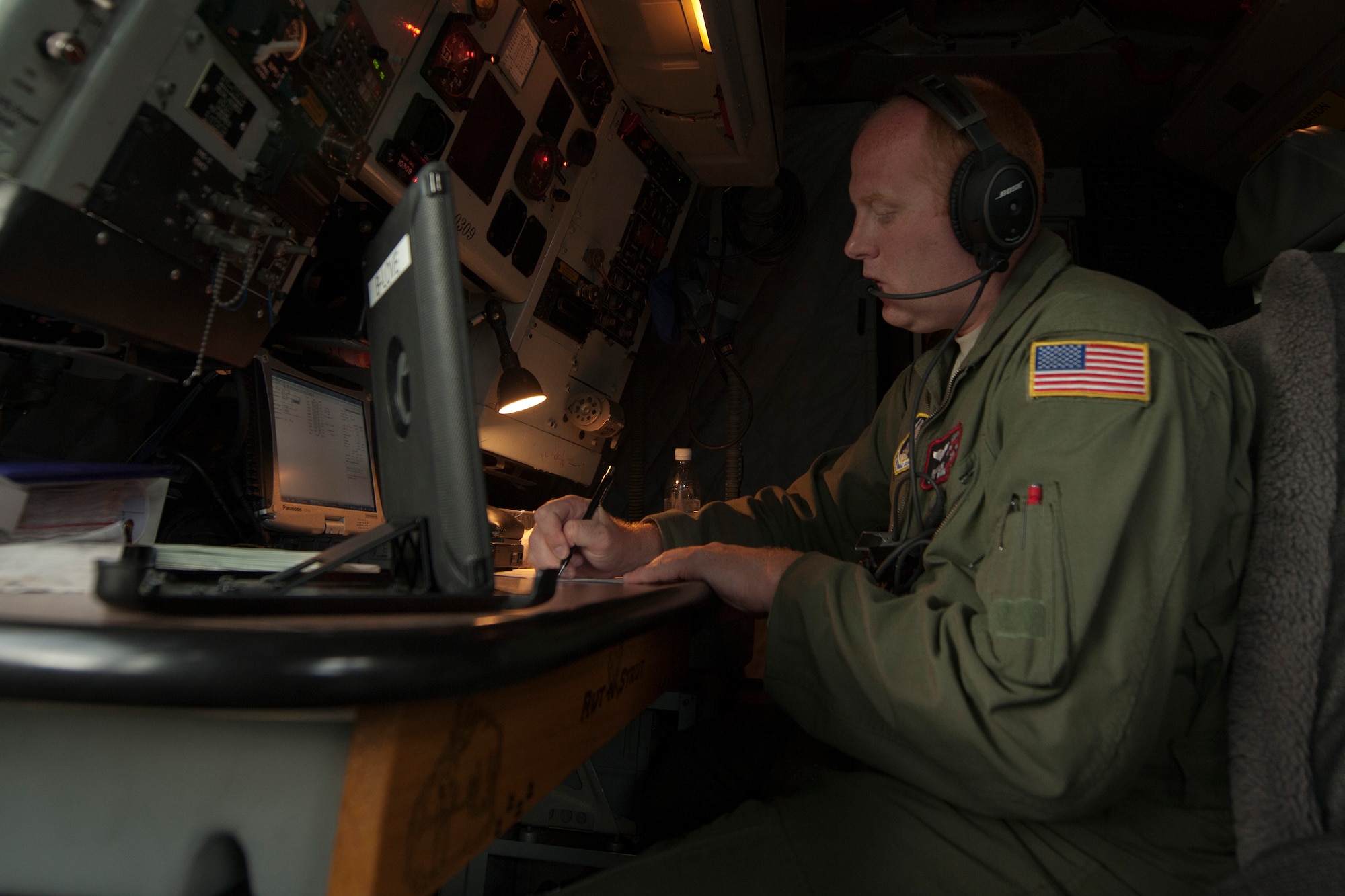 U.S. Air Force Staff Sgt. Brad Love, a 126th Air Refueling Squadron boom operator, creates preflight records for a refueling mission over the North Atlantic Ocean June 11, 2014. The 126th ARS is from the Wisconsin Air National Guard. (U.S. Air Force photo by Tech. Sgt. Paul Villanueva II/Released)