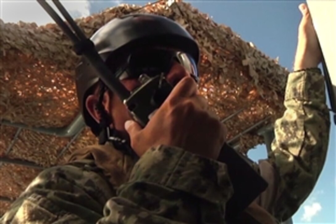 Sailors and Coast Guardsmen hone search and rescue skills as part of the Rim of the Pacific Exercise taking place off the coast of Hawaii, July 21, 2014.