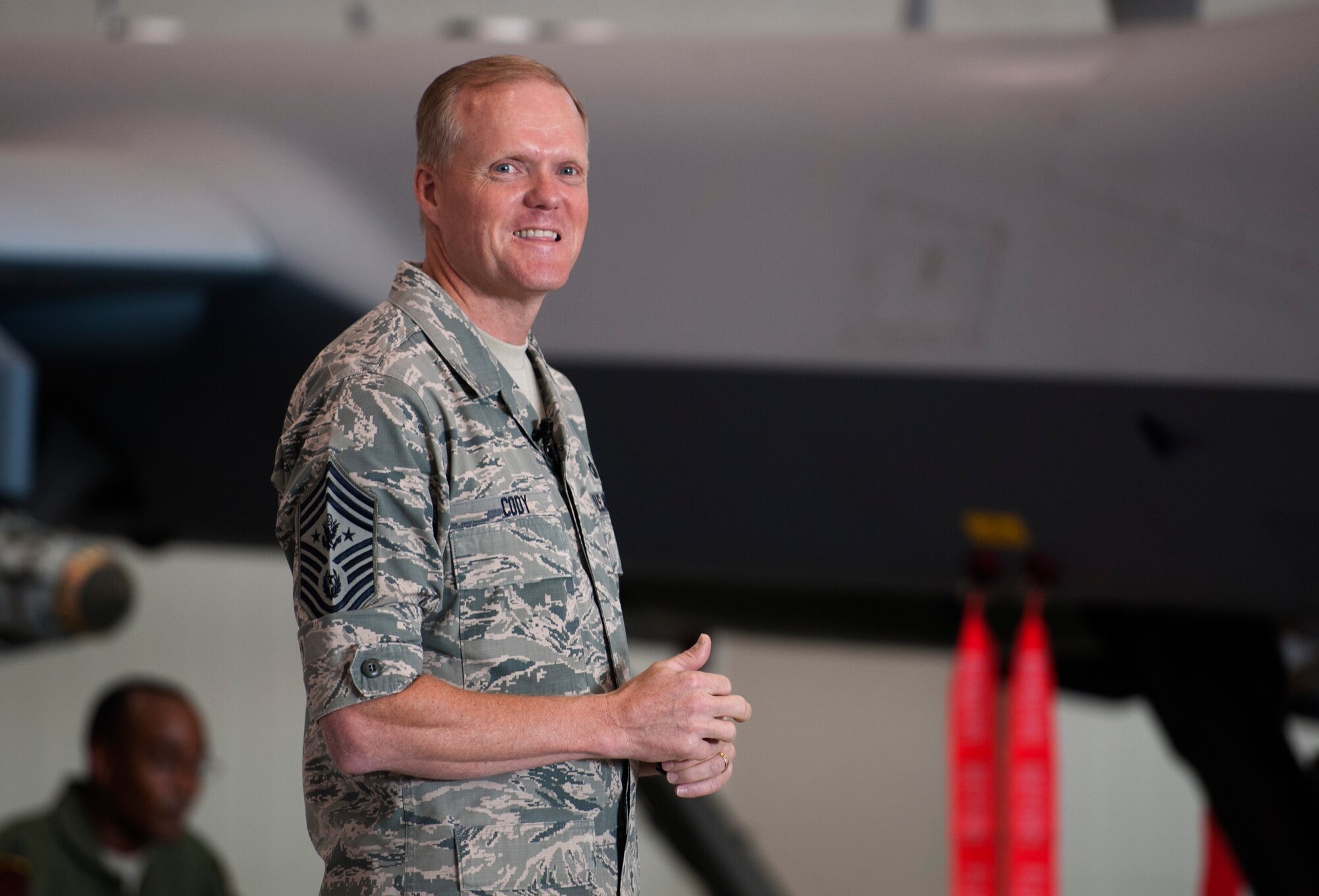 Chief Master Sgt. of the Air Force James A. Cody shares his enlisted perspective with the Airmen of the 432nd Wing and 799th Air Base Group during an all call July 16, 2014, on Creech Air Force Base, Nev. Every day Creech AFB Airmen fulfill their mission by providing intelligence, reconnaissance and surveillance, maintenance, base support and defense, and other capabilities in support of combatant commanders around the globe. (U.S. Air Force photo/Tech. Sgt. Nadine Barclay)