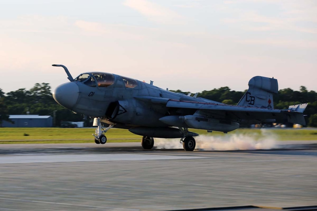 Student pilots perform a touch-and-go landing during field carrier landing practice with the EA-6B Prowler at Marine Corps Auxiliary Landing Field Bogue, N.C., July 17. The pilots are with Marine Tactical Electronic Warfare Training Squadron 1.