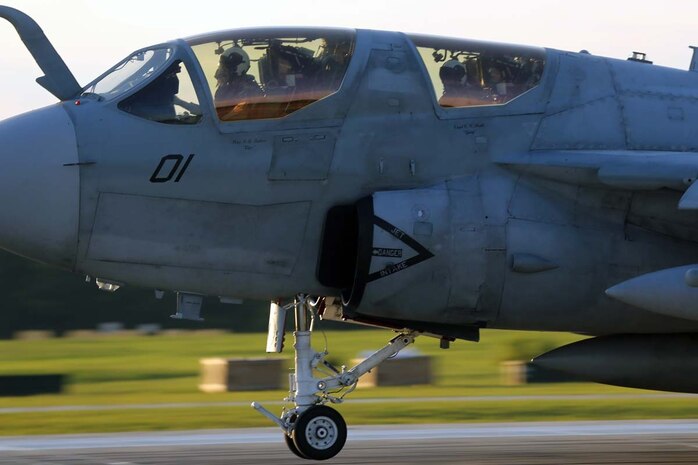 Student pilots with Marine Tactical Electronic Warfare Training Squadron 1 touch down during field carrier landing practice at Marine Corps Auxiliary Landing Field Bogue, N.C., July 17. The pilots were evaluated on their ability to land on an expeditionary airfield in an austere environment.