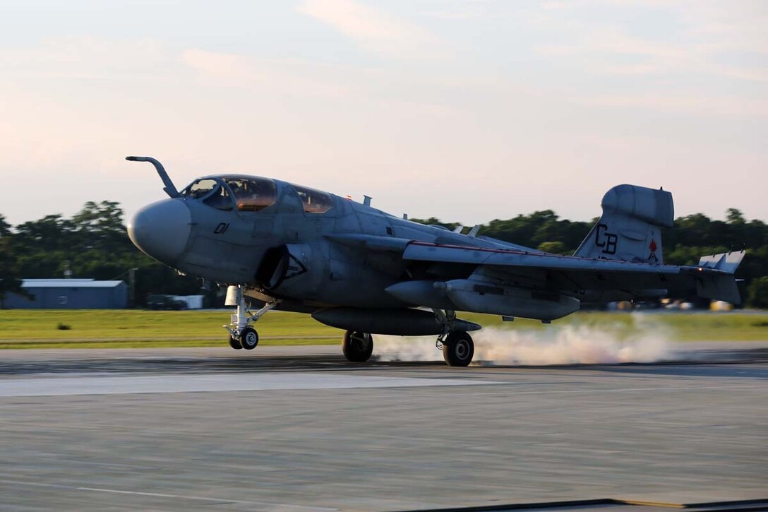 Student pilots perform a touch-and-go landing during field carrier landing practice with the EA-6B Prowler at Marine Corps Auxiliary Landing Field Bogue, N.C., July 17. The pilots are with Marine Tactical Electronic Warfare Training Squadron 1.