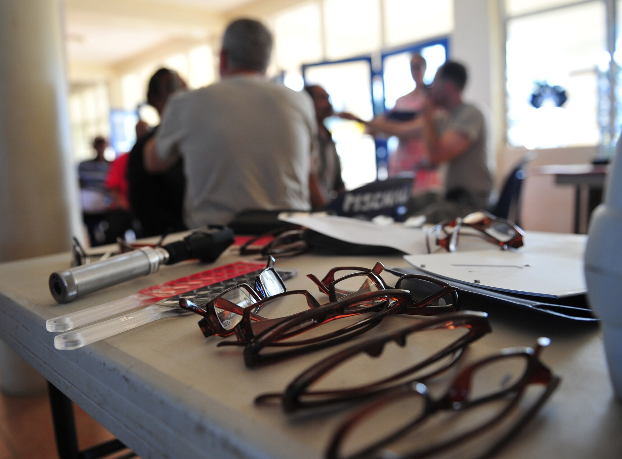 Approximately 2,000 pairs of glasses were delivered to Tonga for those in need of corrective lenses and are prepared July 21, 2014, in Neiafu, Tonga. The optometry clinic was one of four clinics in the healthcare services outreach. The outreach was part of Operation Pacific Angel-Tonga, where, with the help of Red Cross volunteer interpreters, doctors and medical technicians were able to provide acute care and educate patients on preventative health measures for different ailments. (U.S. Air Force photo/Staff Sgt. Rachelle Coleman)