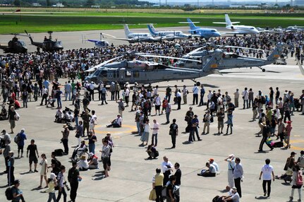 SAPPORO, JAPAN (July 20,2014)- MH-60S Seahawk helicopters from Helicopter Sea Combat Squadron 12 attached to U.S. 7th Fleet flagship USS Blue Ridge sit on display at the Sapporo Air Show.  Blue Ridge port visits strengthen positive military-to-military relationships based on common interests related to maritime security, counterterrorism, defense, trade and security of the Indo-Asia-Pacific region. 