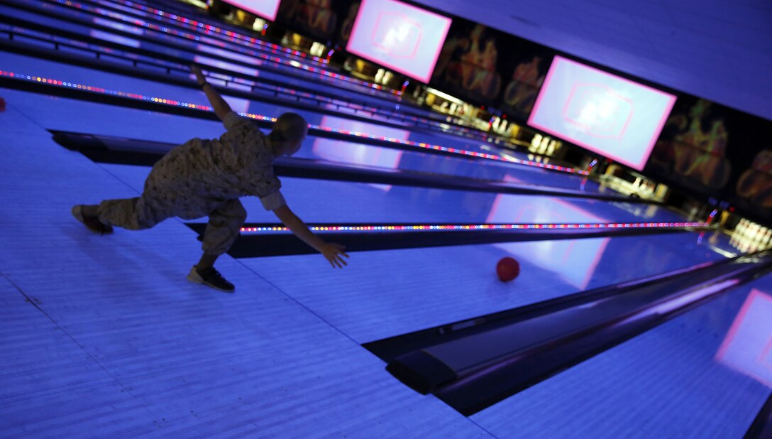 Marines, sailors and families bowl during the grand opening of Leatherneck Lanes, the remodeled base bowling alley on July 17 in the Mainside area of Camp Pendleton. The new bowling alley features a new scoring system, party rooms, lounge, arcade and pool tables. 

For more information visit: http://www.mccscp.com/bowl/