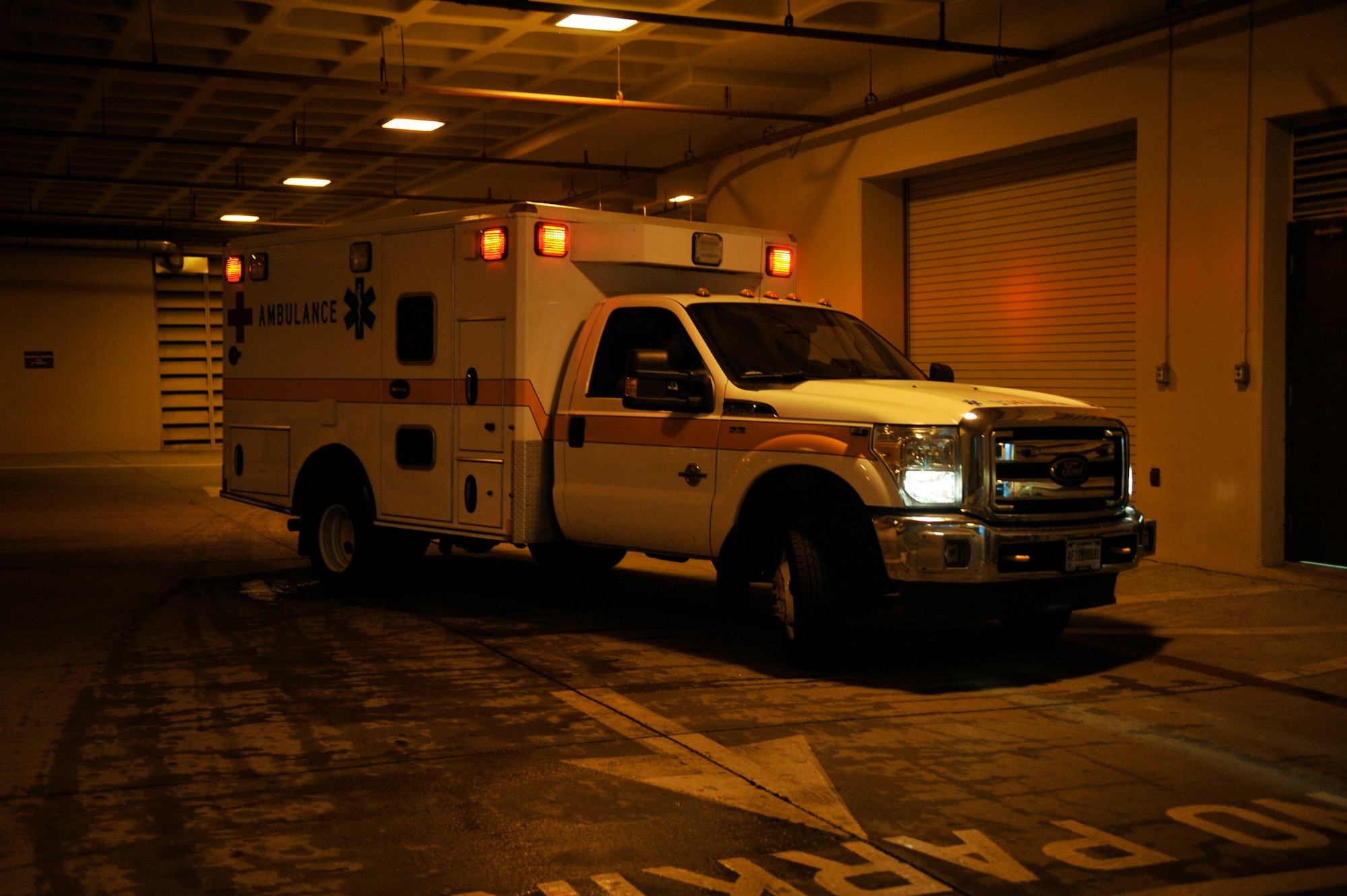 Members of the Field Response Team head towards the simulated aircraft mishap on Osan Air Base, July 23, 2014. The FRT is a designated on-scene medical response team for large scale medical emergencies. (U.S. Air Force photo by Senior Airman David Owsianka)