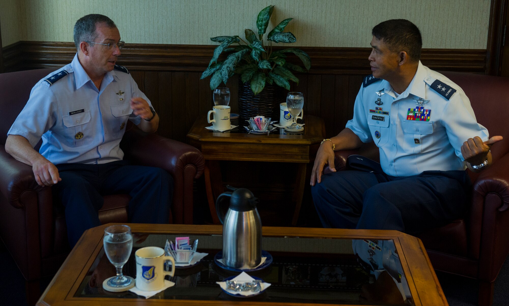 Maj. Gen. Paul McGillicuddy, Pacific Air Forces vice commander, conducts and "office call" with Philippine Air Force Maj. Gen. Raul Dimatatac, PAF Headquarters Air Education and Training commander, at the PACAF headquarters building July 22, 2014 on Joint Base Pearl Harbor-Hickam, Hawaii. During the visit, PACAF and Philippine Air Force leaders conducted Airmen-to-Airmen talks in an effort to solidify partnerships between the two forces. (U.S. Air Force photo by Staff Sgt. Nathan Allen/Released)