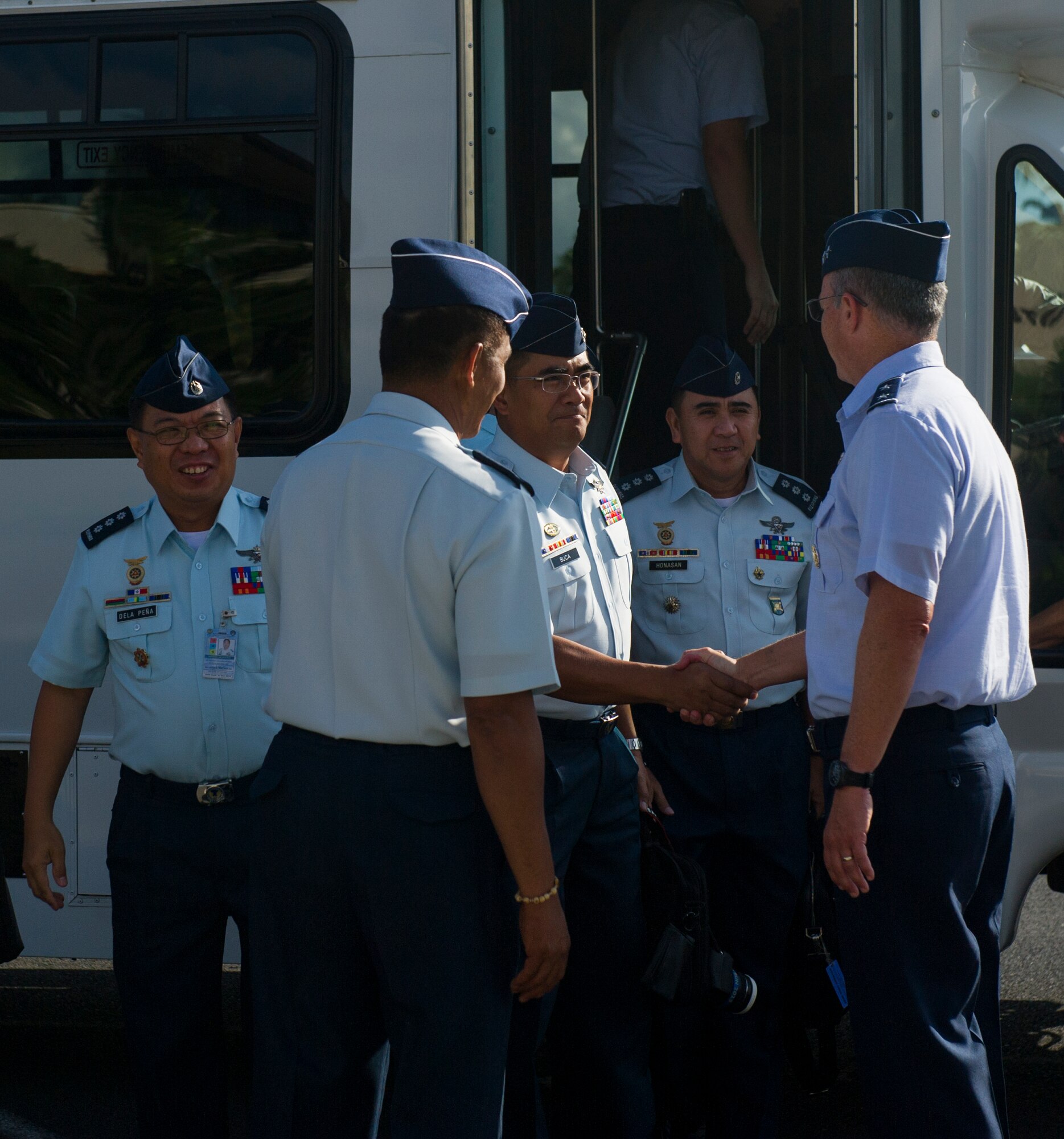 Maj. Gen. Paul McGillicuddy, Pacific Air Forces vice commander (right), greets a delegation from the Philippine Air Force, at the PACAF headquarters building July 22, 2014 on Joint Base Pearl Harbor-Hickam, Hawaii. During the visit, PACAF and Philippine Air Force leaders conducted Airmen-to-Airmen talks in an effort to solidify partnerships between the two forces. (U.S. Air Force photo by Staff Sgt. Nathan Allen/Released)