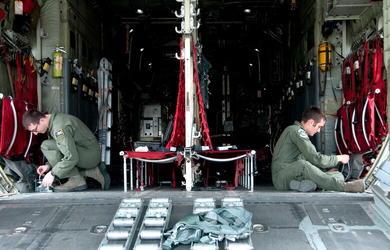 Crew members from the Alaska Air National Guard’s 144th Airlift Squadron set up a C-130 Hercules here to accommodate paratroopers of the 4th Brigade Combat Team (Airborne), 25th Infantry Division as part of a Joint Forcible Entry Exercise on June 7, 2014. The six-day exercise involved more than 1,500 personnel including active duty Army, Air Force and the Air National Guard. (U.S. Air National Guard photo by Staff Sgt. N. Alicia Halla)