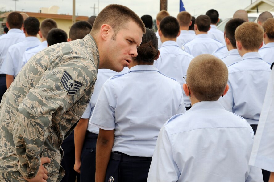 Tech. Sgt. Nicholous Banks, 2nd Security Forces Squadron and former Military Training Instructor, verbally corrects a Civil Air Patrol cadet during drill training at Barksdale Air Force Base, La., July 20, 2014. CAP is a national organization that allows cadets to gain insight into military life as well as leadership abilities. (U.S. Air Force photo/Tech. Sgt. Marie Brown)