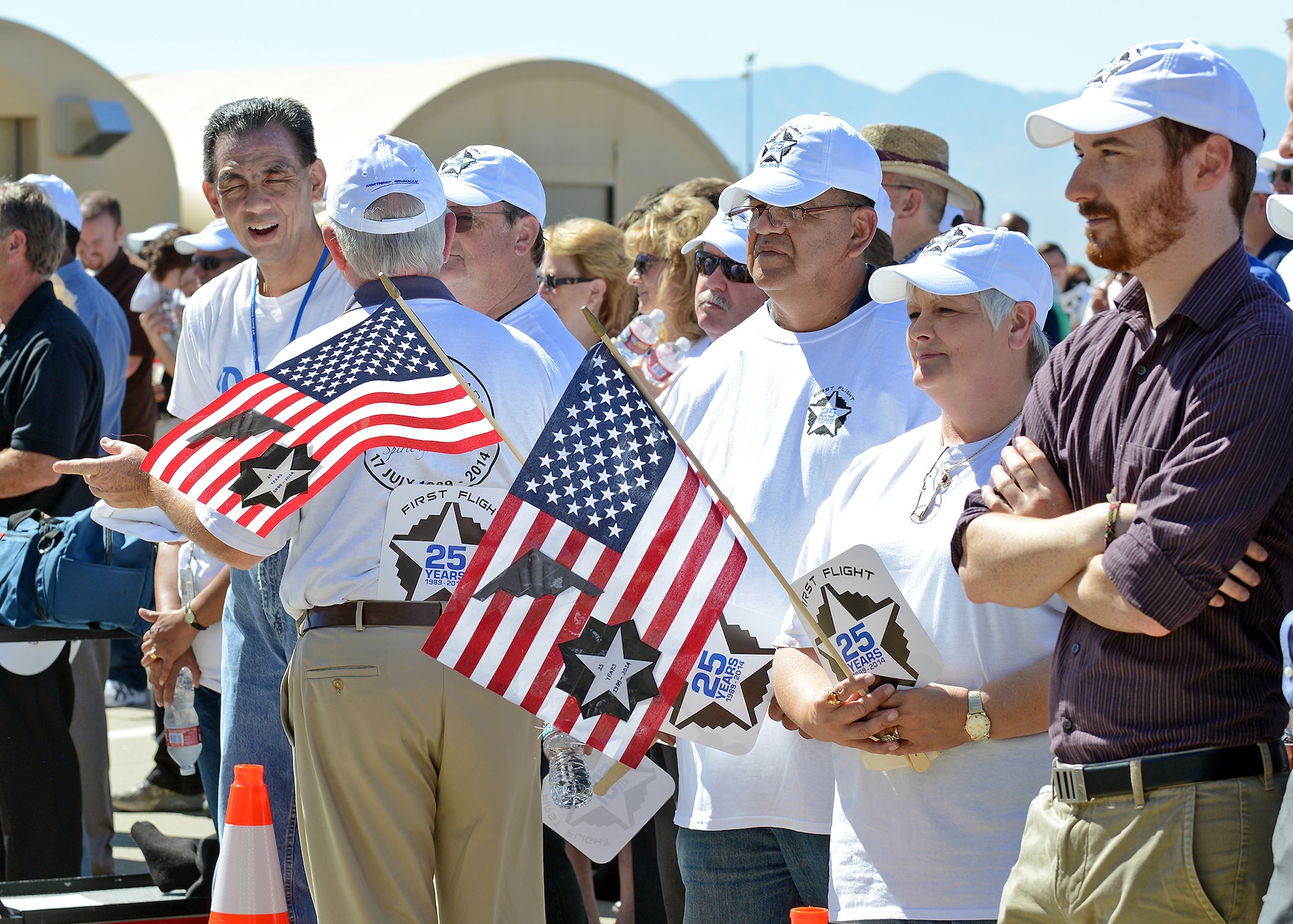 Rae Pappion, project coordinator, was one of many in the crowd of Northrop Grumman employees, civic leaders and military personnel who were present to watch a B-2 Spirit take to the sky, reenacting the first takeoff of the B-2. (U.S. Air Force photo by Jet Fabara)