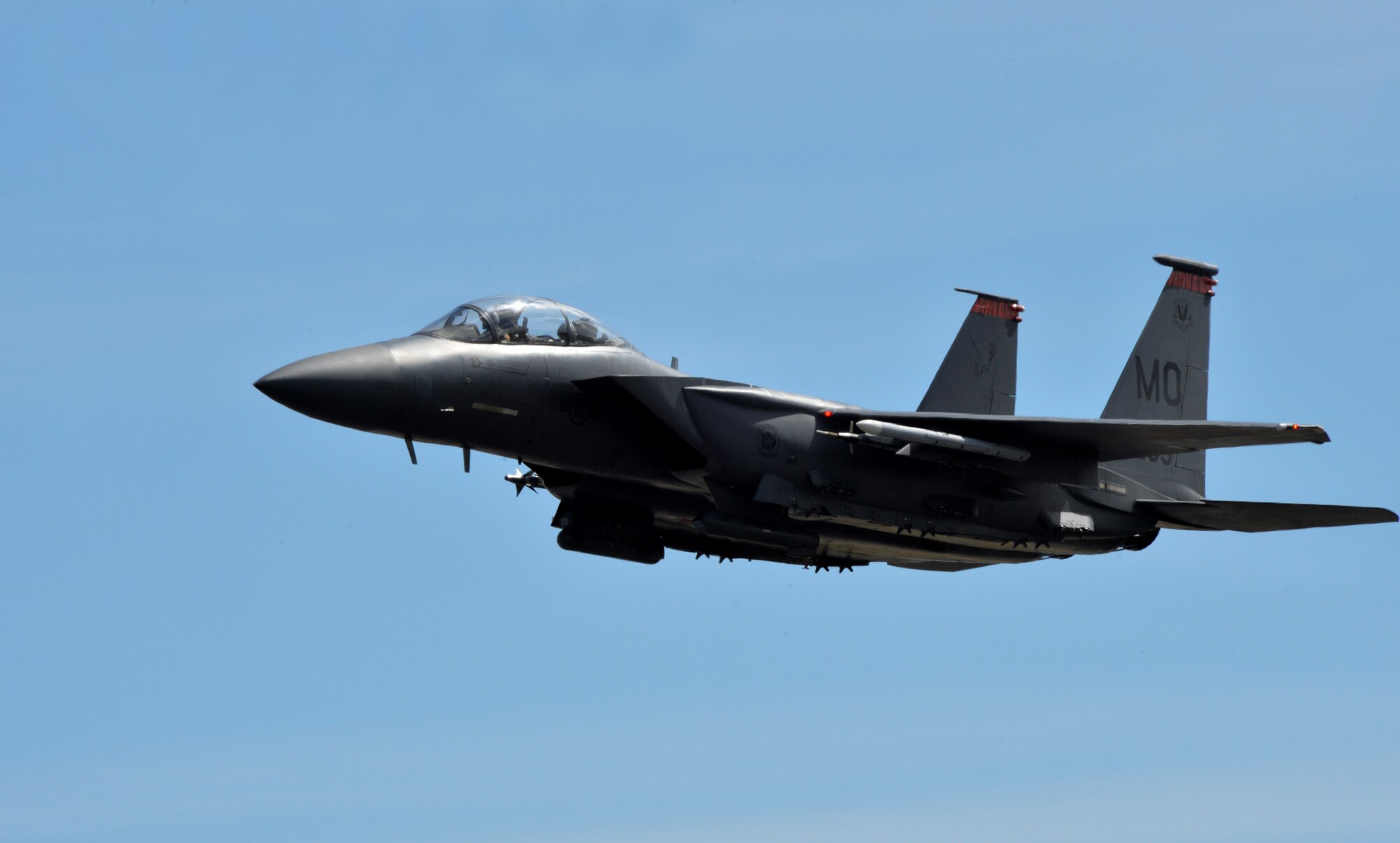 A 391st Fighter Squadron F-15E Strike Eagle takes off during a mission July 16, 2014, at Joint Base Pearl Harbor-Hickam, Hawaii. The 391st FS is currently on a two-month deployment here from Mountain Home Air Force Base, Idaho. While here, the squadron’s F-15Es have participated in Rim of the Pacific 2014 exercise missions. RIMPAC is a U.S. Pacific Command-hosted biennial multinational maritime exercise designed to foster and sustain international cooperation on the security of the world’s oceans. (U.S. Air Force photo by Staff Sgt. Alexander Martinez/Released)