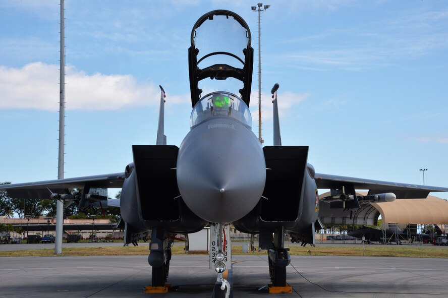 A 391st Fighter Squadron F-15E Strike Eagle stands ready for a mission July 16, 2014, at Joint Base Pearl Harbor-Hickam, Hawaii. The 391st FS is currently on a two-month deployment here from Mountain Home Air Force Base, Idaho. While here, the squadron’s F-15s have participated in Rim of the Pacific 2014 exercise missions. RIMPAC is a U.S. Pacific Command-hosted biennial multinational maritime exercise designed to foster and sustain international cooperation on the security of the world’s oceans. (U.S. Air Force photo by Staff Sgt. Alexander Martinez/Released)