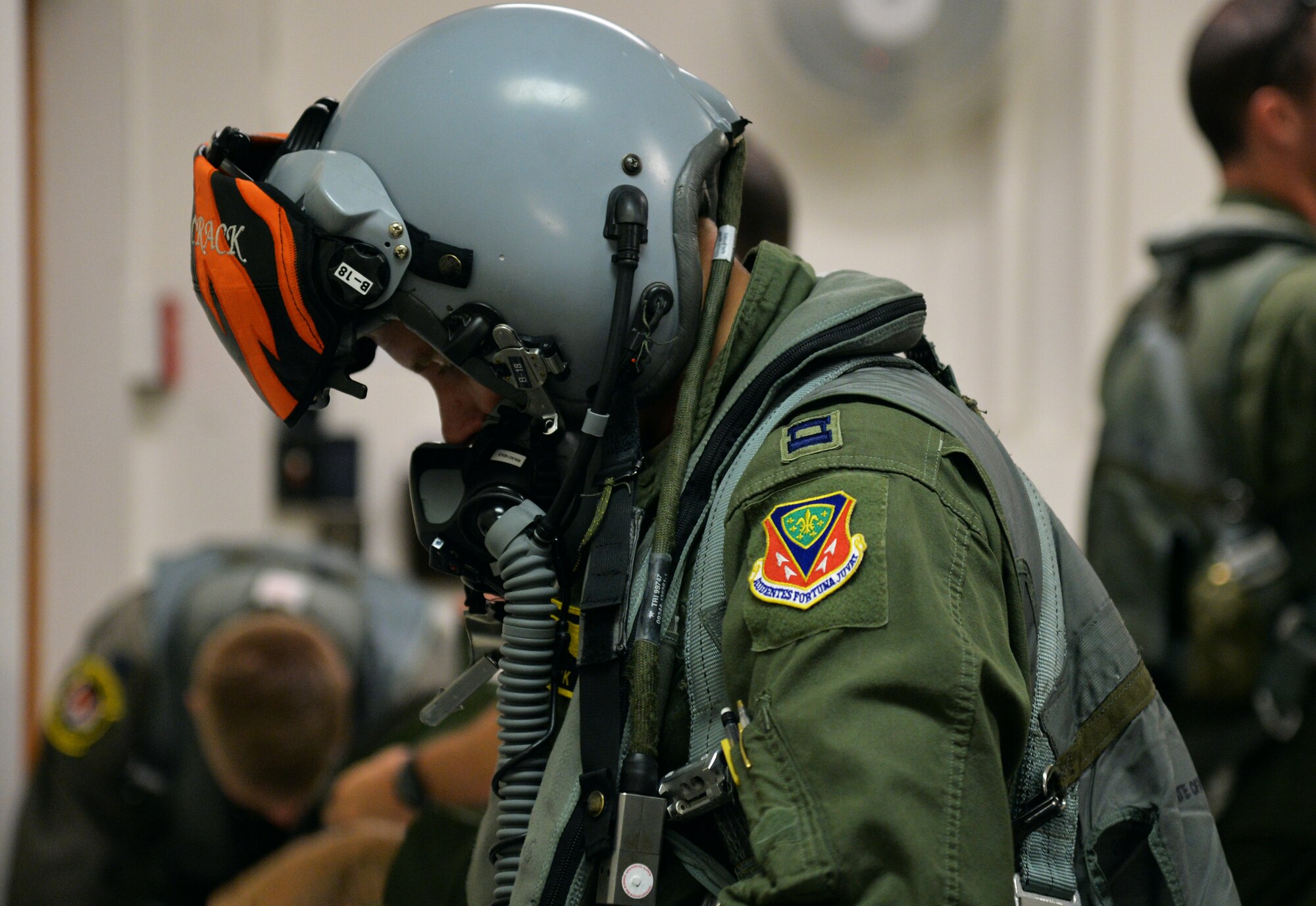 Capt. Jon Kaskela, 391st Fighter Squadron F-15E Strike Eagle pilot, gears up for a mission July 16, 2014, at Joint Base Pearl Harbor-Hickam, Hawaii. The 391st FS is currently on a two-month deployment here from Mountain Home Air Force Base, Idaho. While here, the squadron’s F-15Es have participated in Rim of the Pacific 2014 exercise missions. RIMPAC is a U.S. Pacific Command-hosted biennial multinational maritime exercise designed to foster and sustain international cooperation on the security of the world’s oceans. (U.S. Air Force photo by Staff Sgt. Alexander Martinez/Released)