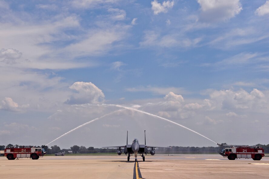 Col. Kevin Fesler, 414th Fighter Group commander, taxis his F-15E Strike Eagle during his fini flight July 18, 2014, at Seymour Johnson Air Force Base, North Carolina. Fesler will retire Aug. 1 after more than 23 years of active service. (U.S. Air Force photo/Airman 1st Class Aaron J. Jenne)