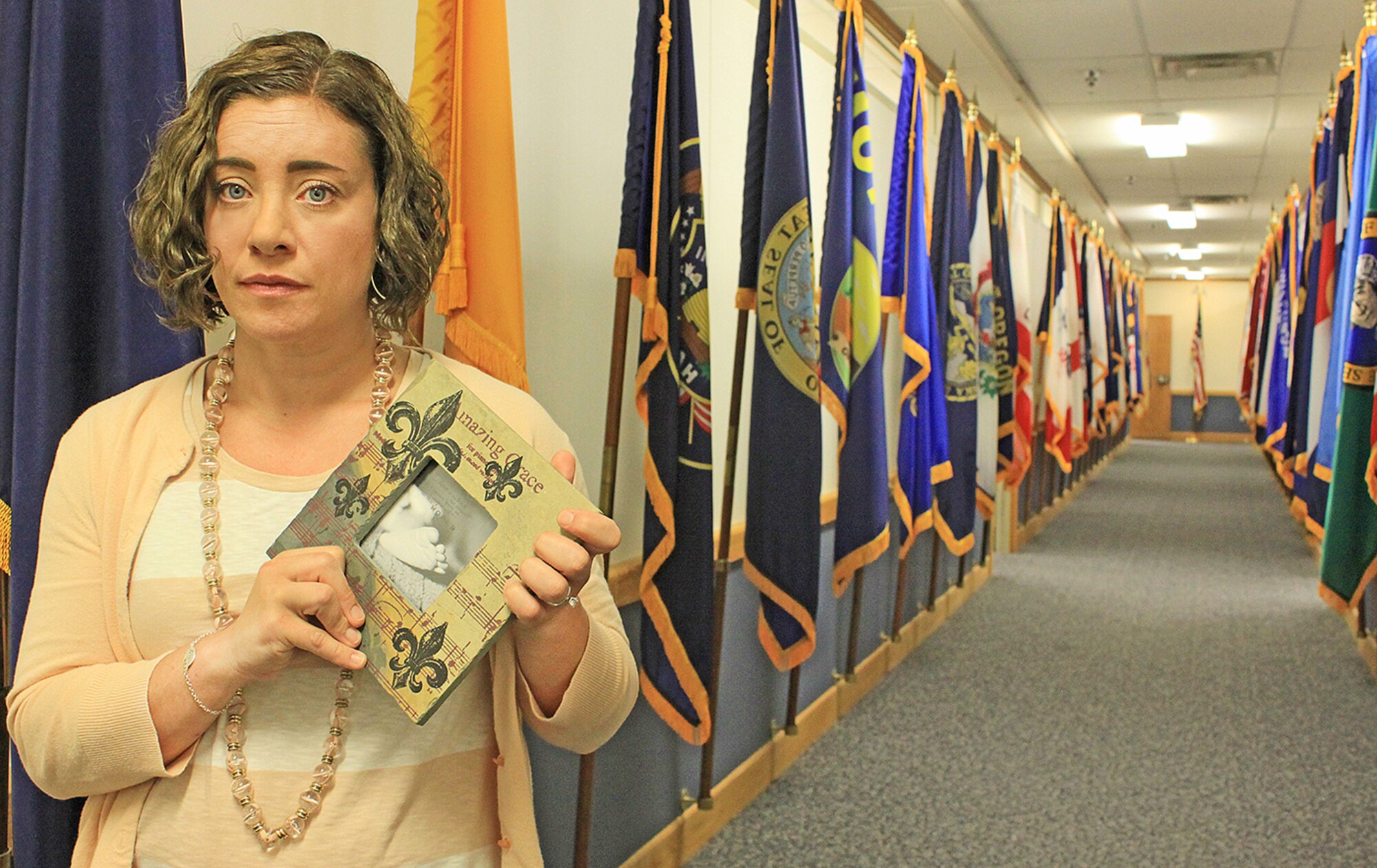 The loss of her daughter at birth was a devastating blow for Jennifer Treat, but the community support coordinator for Headquarters Air Force Material Command and her husband, Staff Sgt. Mark Treat, have proved resilient. The couple now has faternal twin boys, but Grace lives on in their hearts. (Skywrighter photo by Tara Dixon engal)
