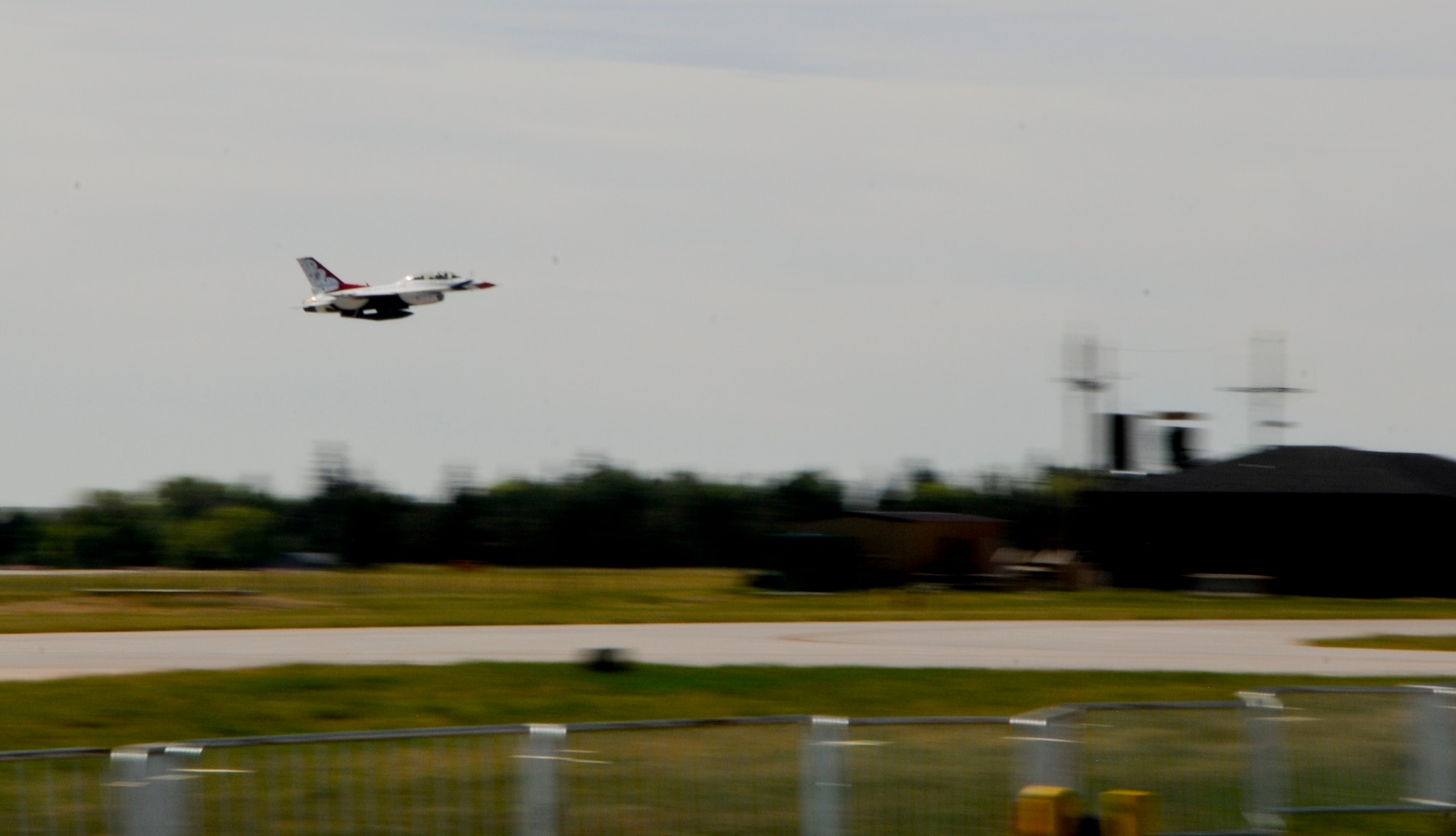 Maj. Mike Fisher, U.S. Air Force Thunderbirds #8 advance pilot and narrator, takes off in his Thunderbirds F-16 carrying Cory Sullivan, Root Sports analyst and former Colorado Rockies Outfielder, July 21, 2014, at the Wyoming Air National Guard base in Cheyenne, Wyo. Sullivan described the flight as intense, and said he is impressed the pilots can control the jet while exposed to strong g-forces. (U.S. Air Force photo by Airman 1st Class Jason Wiese)