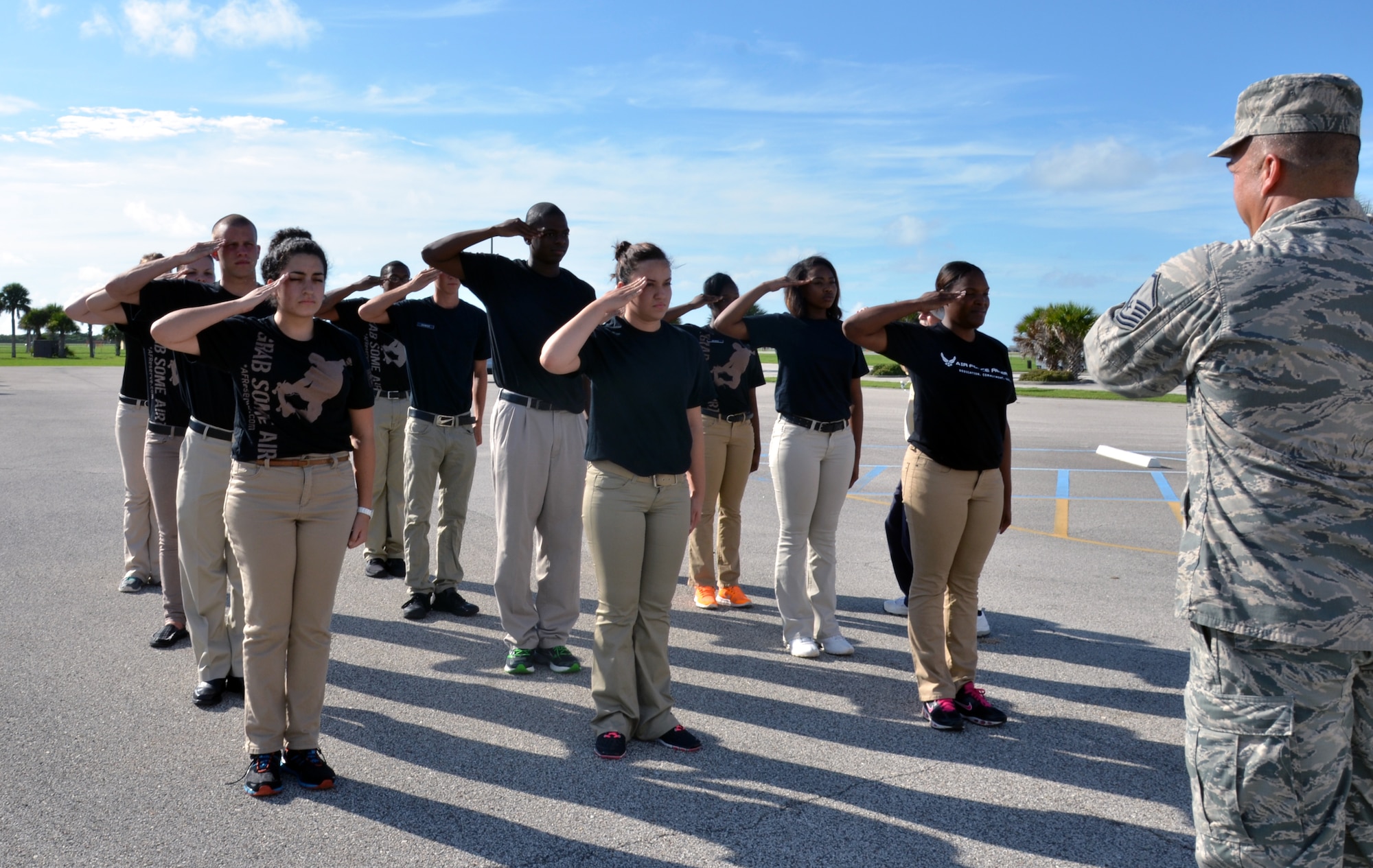 Master Sgt. Tommy C. Cowen, Developmental and Training Flight program manager assigned to the 920th Rescue Wing, train new airmen in the DTF how to present arms during a unit’s training assembly at Patrick Air Force Base, Fla., July 12, 2014.