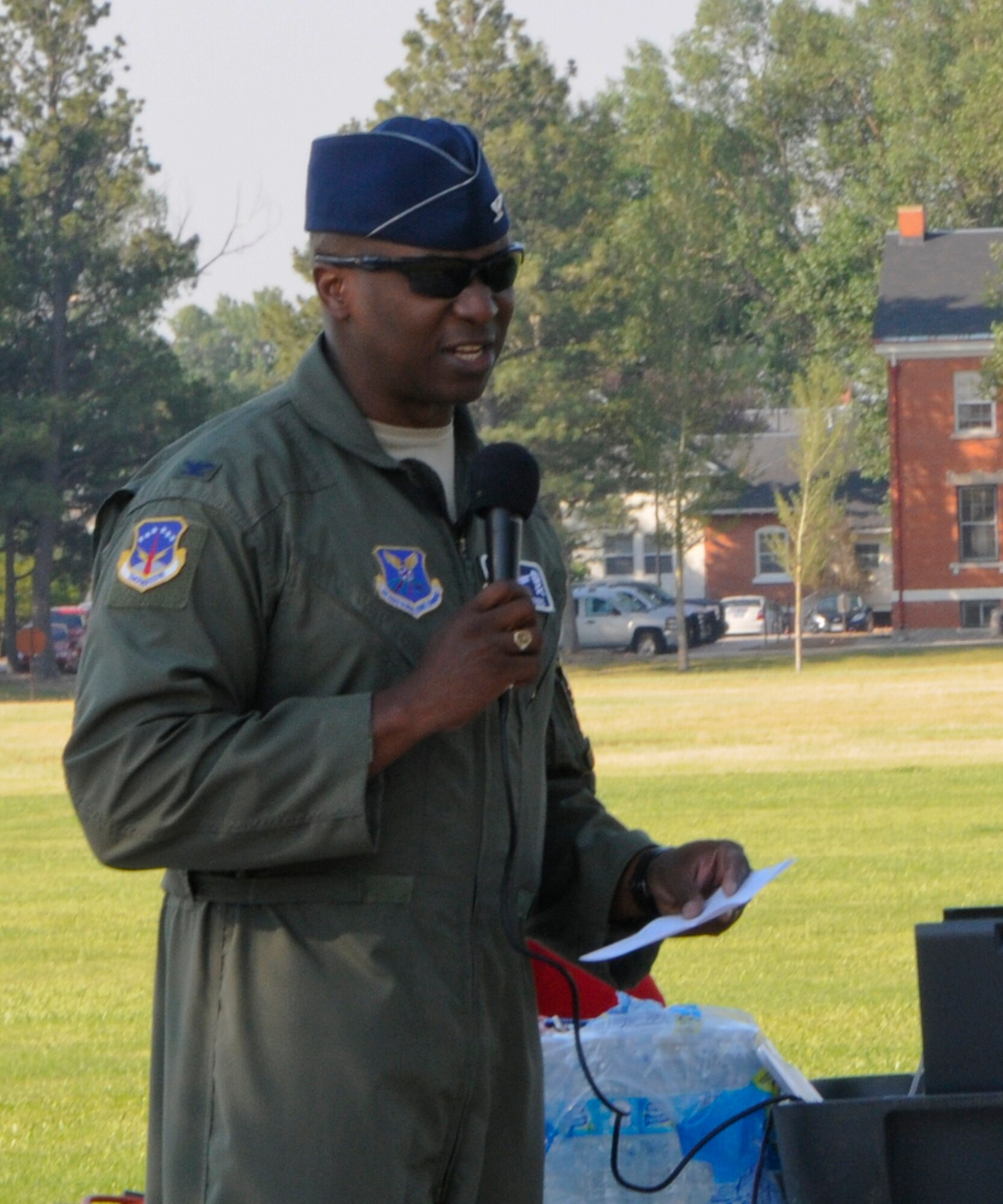 Col. Carl Jones, 90th Missile Wing vice commander, gives opening remarks at the 36th Annual Buffalo Stampede July 19, 2014, near the Argonne Parade Field. The Buffalo Stampede is a footrace along F.E. Warren Streets intended to bring the military and civilian communities together for friendly competition and to promote fitness. (U.S. Air Force photo by Airmen 1st Class Jason Wiese)
