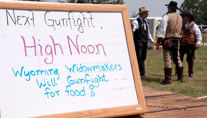 The Wyoming Widowmakers prepare for a demonstration July 19 as part of the Fort D.A. Russell Days activities. The Widowmakers perform anywhere they are invited, following the slogan: Will gunfight for food. (U.S. Air Force photo by Airman 1st Class Brandon Valle)