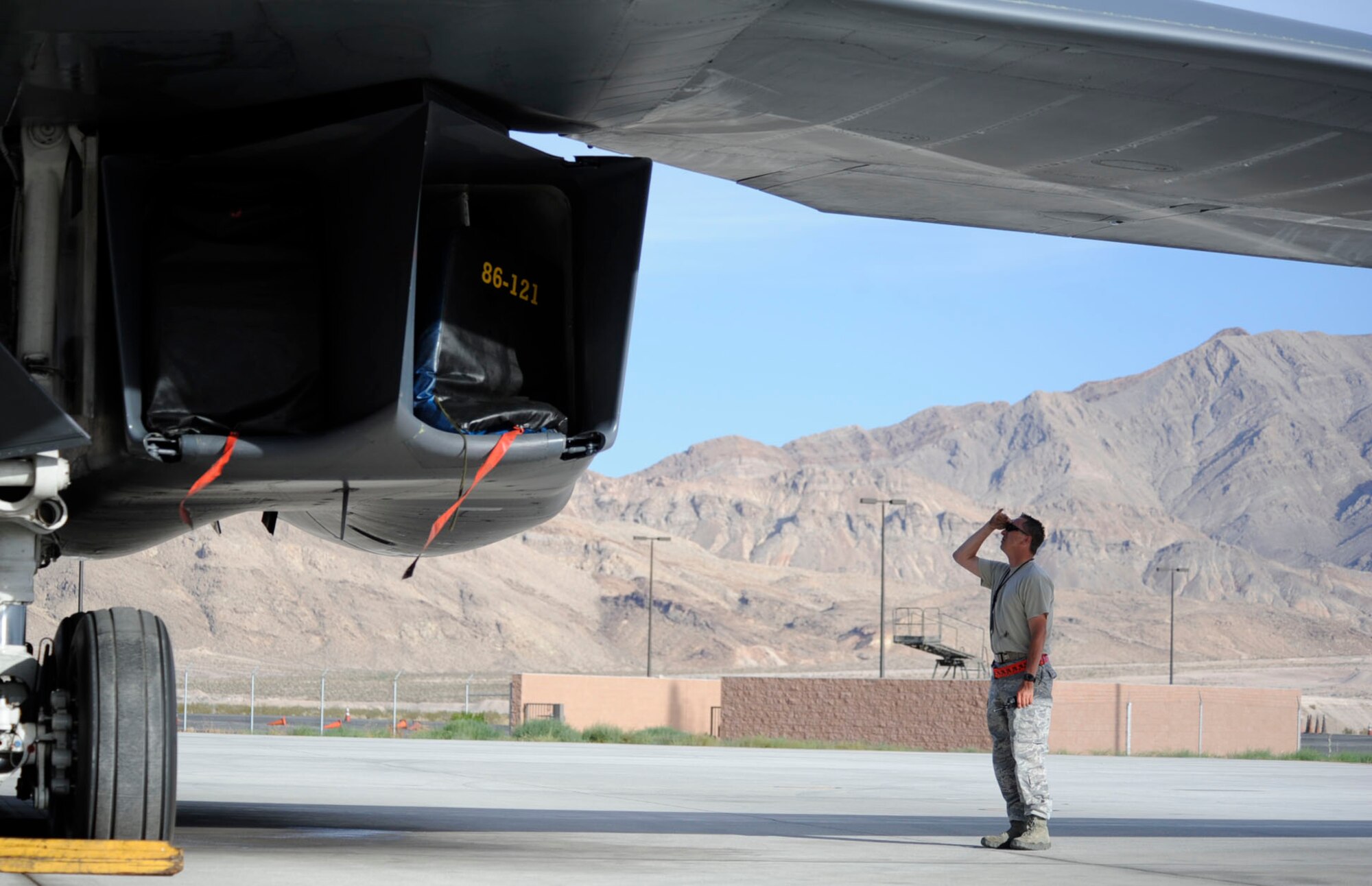 Master Sgt. Charles Bridges,  28th Aircraft Maintenance Squadron production superintendent, performs a walk around inspection prior to crew show during Red Flag 14-3 on Nellis Air Force Base, Nev., July 14, 2014.  More than 150 Airmen and several aircraft from Ellsworth AFB, S.D., joined more than 100 aircraft and 2,400 Airmen at Nellis in support of the training exercise. (U.S. Air Force photo by Tech. Sgt. Jerry Fleshman/Released) 