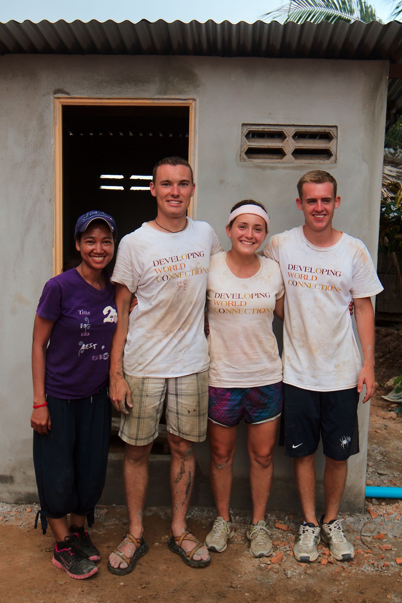 Sotheavy Sov of Equitable Cambodia, a Cambodian non-governmental agency, poses for a photo with (left to right) Cadet 1st Class Dylan Juedeman, Cadet 2nd Class Hansena Vangen and Cadet 2nd Class Luke Stensberg, during a recent Cultural Immersion Program trip to Cambodia. During the trip, the cadets built latrines and spent time with Cambodian citizens. The trip was led by Col. Marty France, Astronautics Department head and an Academy permanent professor. (U.S. Air Force photo)
