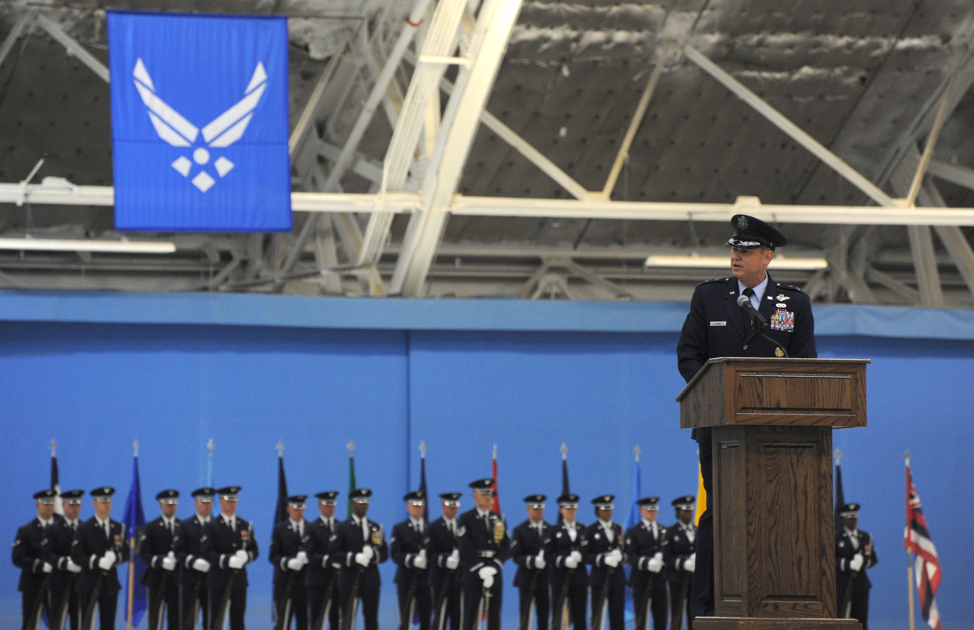 Maj. Gen. Darryl W. Burke addresses audience members during the Air Force District of Washington change of command ceremony at Joint Base Andrews, Maryland, July 22, 2014. Maj. Gen. Darryl W. Burke assumed command of AFDW from Maj. Gen. Sharon K. G. Dunbar. Burke joins AFDW after a decorated Air Force career serving in a variety of positions as a navigator and commander. His commands include an operations support squadron, a reconnaissance wing, a flying squadron, an air expeditionary wing and a training wing. (U.S. Air Force photo/Master Sgt. Tammie Moore)