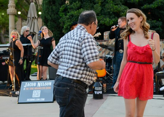 The entertainment for the evening was provided by Jacob Nelson and the Tone Wranglers. Line dance instructors were available to teach guests a few new steps. (U.S. Air Force photo by Rebecca Amber) 
