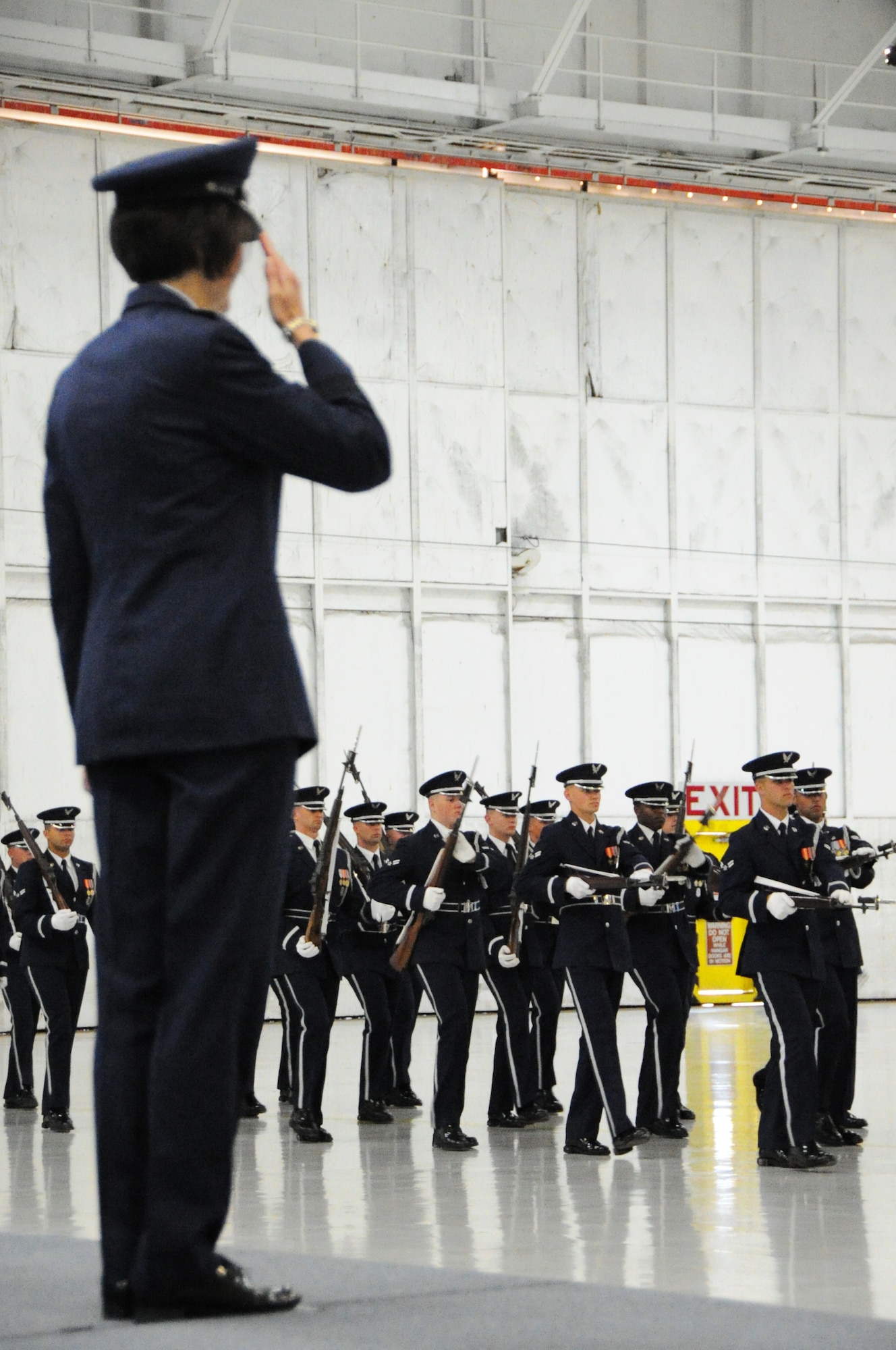 Maj. Gen. Sharon K. G. Dunbar gives her final salute to Airmen during the AFDW change of command ceremony on Joint Base Andrews, Maryland, July 22, 2014. Maj. Gen. Darryl W. Burke assumed command of AFDW from Dunbar during the ceremony. (U.S. Air Force photo/Staff Sgt. Matt Davis)