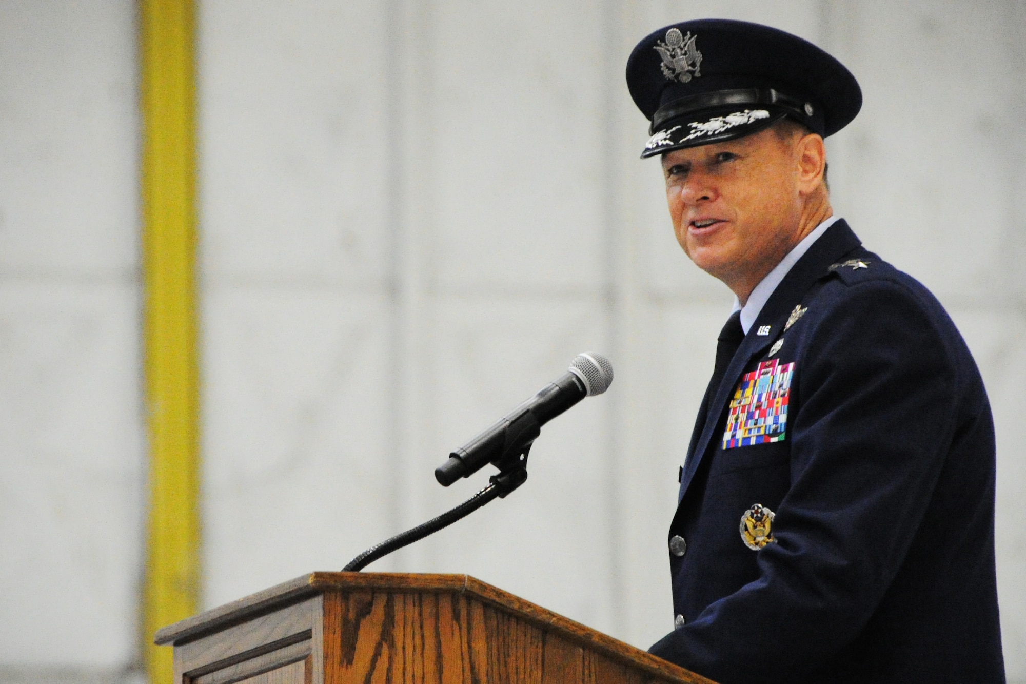 Air Force District of Washington Commander Maj. Gen. Darryl W. Burke addresses Airmen during the AFDW change of command ceremony on Joint Base Andrews, Maryland, July 22, 2014. Burke assumed command of AFDW from Maj. Gen. Sharon K. G. Dunbar during the ceremony. (U.S. Air Force photo/Staff Sgt. Matt Davis)