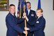GOODFELLOW AIR FORCE BASE, Texas -- Col. Brendan M. Harris, 17th Training Group Commander, passes the 315th Training Squadron guidon to the incoming commander, Lt. Col. Stefanie S. Peterson during the change of command ceremony July 18. The change of command ceremony is steeped in tradition and allows units to witness the formal command transfer from one officer to another. (U.S. Air Force photo/ Staff Sgt. Laura R. McFarlane)
