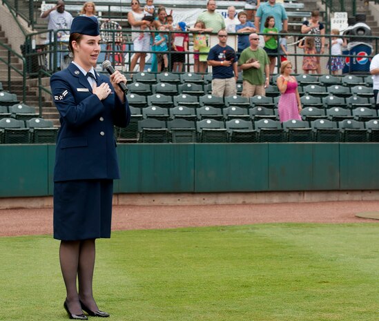 Airman 1st Class Sydney Manning, 628th Air Base Wing Public Affairs broadcaster, sings the National Anthem during Military Appreciation Night July 13, 2013, at Joseph P. Riley Jr. ballpark in Charleston, S.C. Manning performed for more than 5,000 attendees at the Charleston RiverDogs hosted Military Appreciation Night. (U.S. Air Force photo/ Staff Sgt. William A. O’Brien)