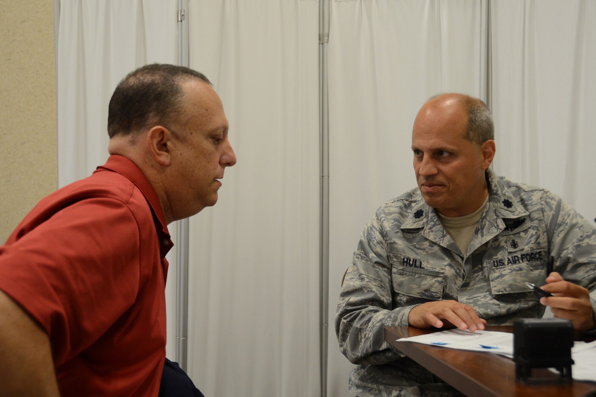 One of more than 60 Airmen reviews his medical paperwork during an Individual Ready Reserve Muster July 19, 2014 at the Niagara Falls Air Reserve Station, N.Y. By attending this Muster, the Airmen fulfilled military requirements to IRR. Unlike their traditional reserve counterparts, Airmen assigned to the IRR do not have to attend Unit Training Assemblies and are not obligated to attend annual training. The only military duty they have is to attend an annual paid Muster. (U.S. Air Force photo illustration by Tech. Sgt. Andrew Caya)