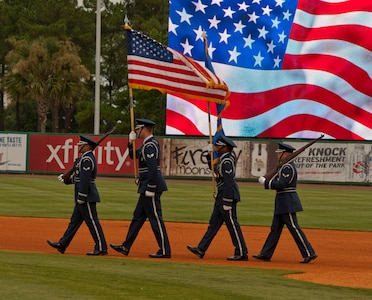 Joint Base Charleston Honor Guard posts the colors for Military Appreciation night at the Charleston RiverDogs game Aug. 21, 2013, at Joseph P. Riley Jr. ballpark in Charleston, S.C. The Charleston RiverDogs hosted Military Appreciation Night to show their support for the local military. (U.S. Air Force photo/ Staff Sgt. William A. O’Brien)