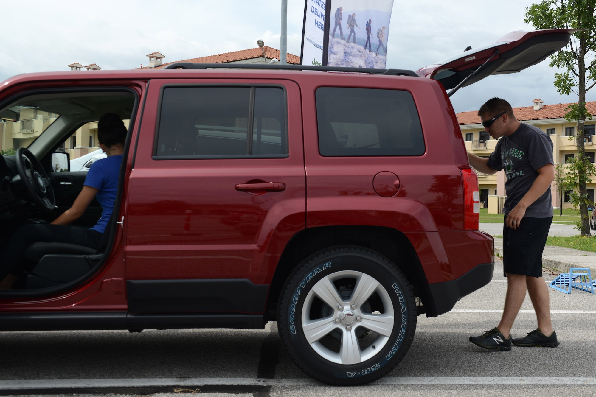 (From right) Senior Airman Ian Ginn, 31st Security Forces Squadron, and his
wife, Zoe Ginn, look for a new vehicle to purchase, July 22, 2014. To help
protect Airmen and families from falling victim to fraudulent vehicle sales,
the pass and registration office offers simple tips and tools to ease the
car-buying process and avoid problems commonly attributed to buying cars
outside the U.S. (U.S. Air Force photo/Airman 1st Class Ryan Conroy)
