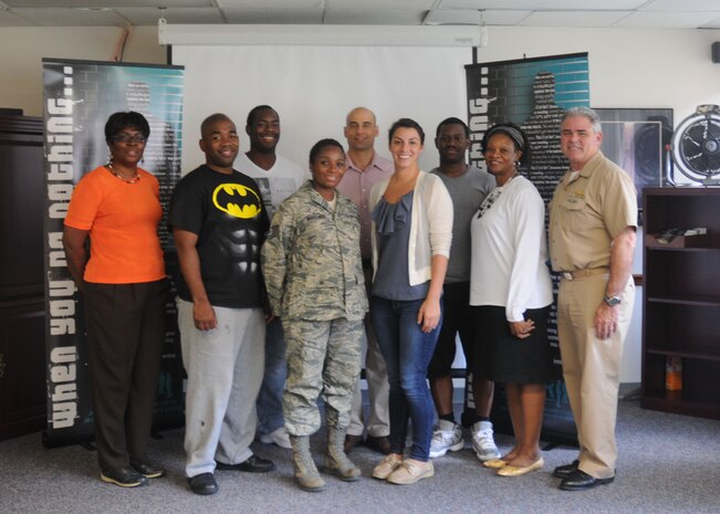 Navy Capt. Timothy Sparks, Joint Base Charleston deputy commander, Florine King, Joint Base Charleston - Air Base Sexual Assault Response Coordinator and Sheila Bacon, JB Charleston - Air Base Sexual Assault Victim Advocate welcomes the newest members of the SAPR team July 18, 2014, at JB Charleston - Air Base, S.C. (Left to right) King, Tech. Sgt. Cliff Pinckney, Staff Sgt. Corey McClure, Tech. Sgt. Tarha Burchell, Tech. Sgt. Amine El Iahiai, 2nd Lt. Alexandra Trobe, Staff Sgt. Jarid Hasty-Milton, Bacon and Sparks (not photographed: Staff Sgt. Dan Aldenete). (Courtesy Photo)