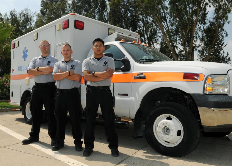 Medical technicians from the 39th Medical Operations Squadron ambulance services, pose for a photo, July 22, 2014, Incirlik Air Base, Turkey. Ambulance services provides medical emergency response when someone dials 112 and is active around the clock to ensure the care of servicemembers and their families at Incirlik AB. (U.S. Air Force photo by Staff Sgt. Caleb Pierce/Released)  