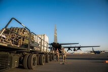 U.S. Air Force Master Sgt. Scott Francesangeli, 737th Expeditionary Airlift Squadron C-130H loadmaster, inspects cargo about to be loaded onto a C-130H Hercules July 20, 2014 at an undisclosed location in Southwest Asia. Loadmasters ensure all cargo and personnel to be transported on a plane are secured and properly placed to ensure the plane can safely fly. Francesangeli deployed here from the 910th Airlift Wing, Youngstown Air Reserve Station, Ohio in support of Operation Enduring Freedom. (U.S. Air Force photo by Staff Sgt. Jeremy Bowcock)