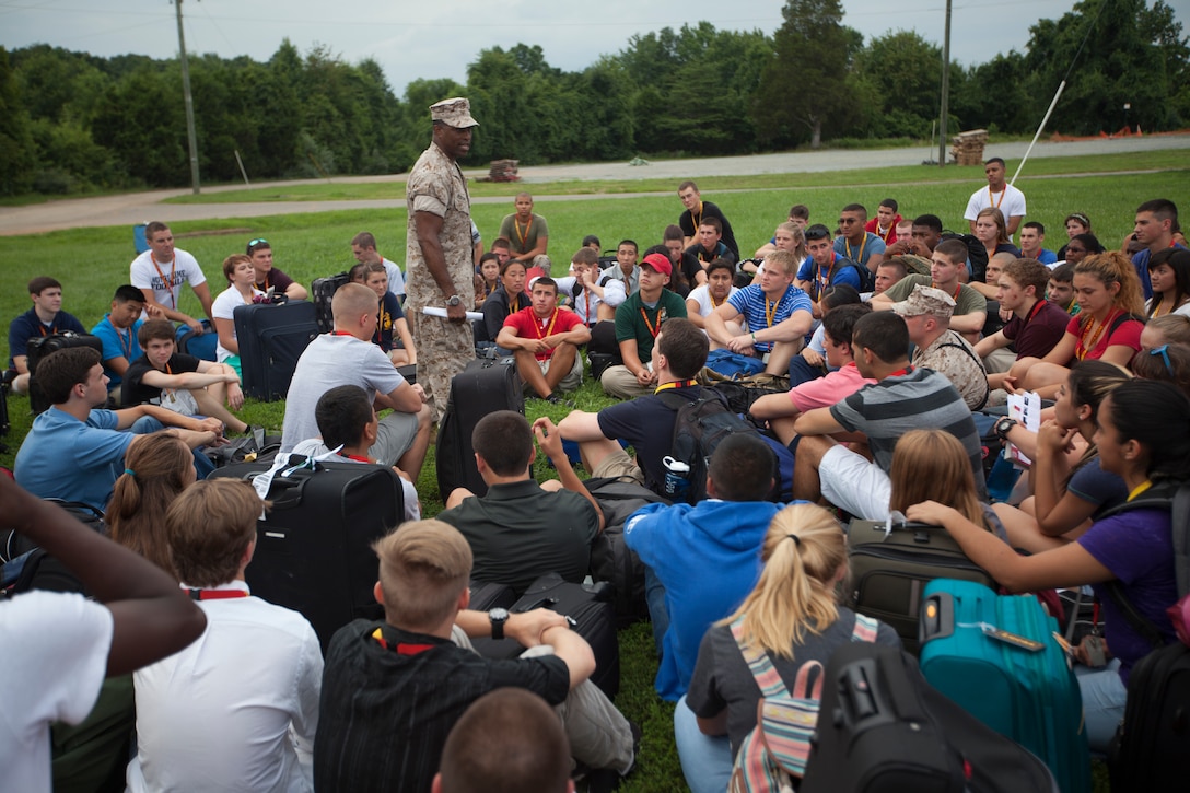 Participants of the Summer Leadership and Character Development Academy (SLCDA) have a talk with Lt. Col. David Rodgers, Diversity Officer of Marine Corps Recruiting Command after meeting Marine Corps drill instructors, July 20 on Marine Corps Base Quantico. High school juniors and seniors from across the United States of America and beyond gather this one week to learn what it means to be a leader in the Marine Corps. (U.S. Marine Corps photo by Lance Cpl. Brandon Thomas)