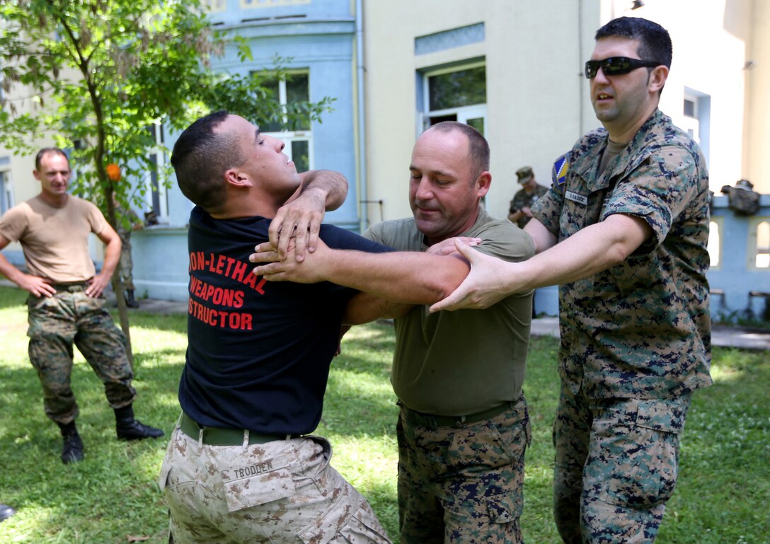 Marines in support of Black Sea Rotational Force 14 begin non-lethal system instruction with the Armed Forces of Bosnia and Herzegovina in Sarajevo, Bosnia, July 22. The exercise will cover riot control, Taser training and certification, pepper spray training and live fire of non-lethal rounds.