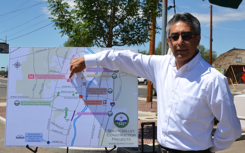 ALBUQUERQUE, N.M., -- Jerry Nieto, project manager, U.S. Army Corps of Engineers, Albuquerque District, points to where construction of the Southwest Valley Flood Reduction Phase 2C Project will occur.  Nieto recently attended a media conference, organized by Bernalillo County, to discuss a variety of projects under construction in the Southwest Valley.   