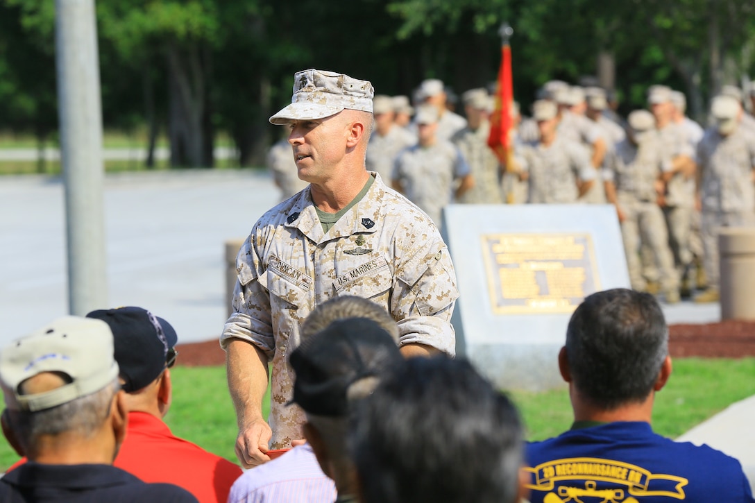 Sgt. Maj. Garritt Duncan, 2nd Reconnaissance Battalion sergeant major, addresses the crowd of former recon Marines and their family members before rededicating the unit's memorial aboard Marine Corps Base Camp Lejeune, June 27. (Official Marine Corps photo by Cpl. Cameron O. Payne)