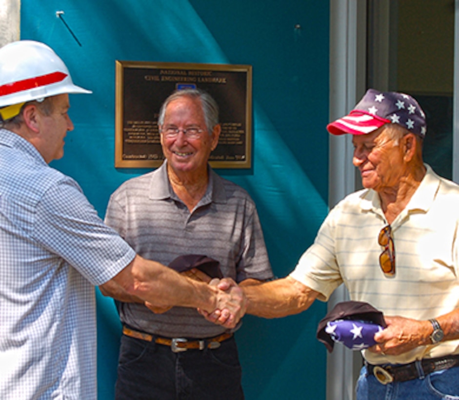 Dean Webster and Aaron Hagaman, former employees of The Dalles Lock and Dam, are recognized for their dedication, service and commitment to the construction of The Dalles Lock and Dam by Ron Twiner, project manager for The Dalles Lock and Dam operations.

Here they are being presented with hats to commemorate the day and recognize their hard work in years past.