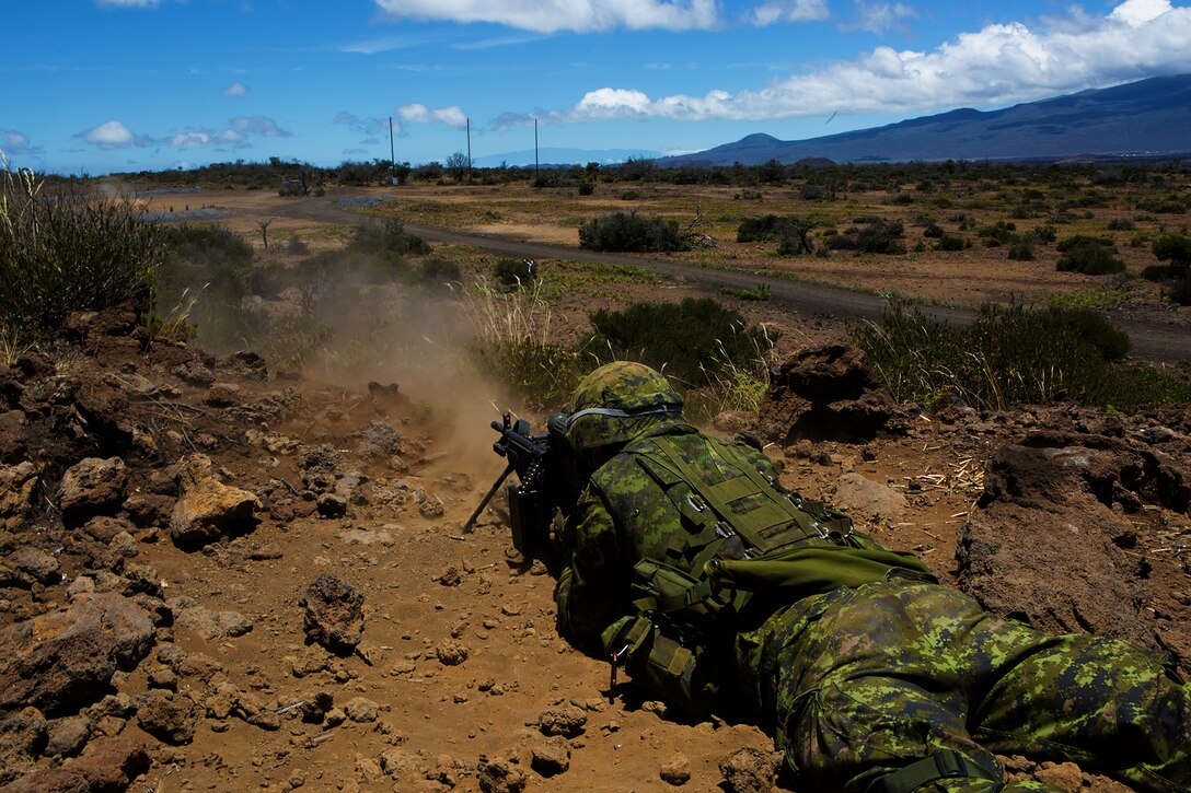 POHAKULOA TRAINING AREA, Hawaii - A soldier with Princess Patricia's Canadian Light Infantry fires off his weapon at a target during a live fire shoot, as part of Rim of the Pacific (RIMPAC) Exercise 2014, July 18. Twenty-two nations, more than 40 ships and submarines, about 200 aircraft and 25,000 personnel are participating in RIMPAC from June 26 to Aug. 1 in and around the Hawaiian Islands and Southern California. The world's largest international maritime exercise, RIMPAC provides a unique training opportunity that helps participants foster and sustain the cooperative relationships that are critical to ensuring the safety of sea lanes and security on the world's oceans. RIMPAC 2014 is the 24th exercise in the series that began in 1971. (U.S. Marine Corps photo by Cpl. Erik Estrada/Released)
