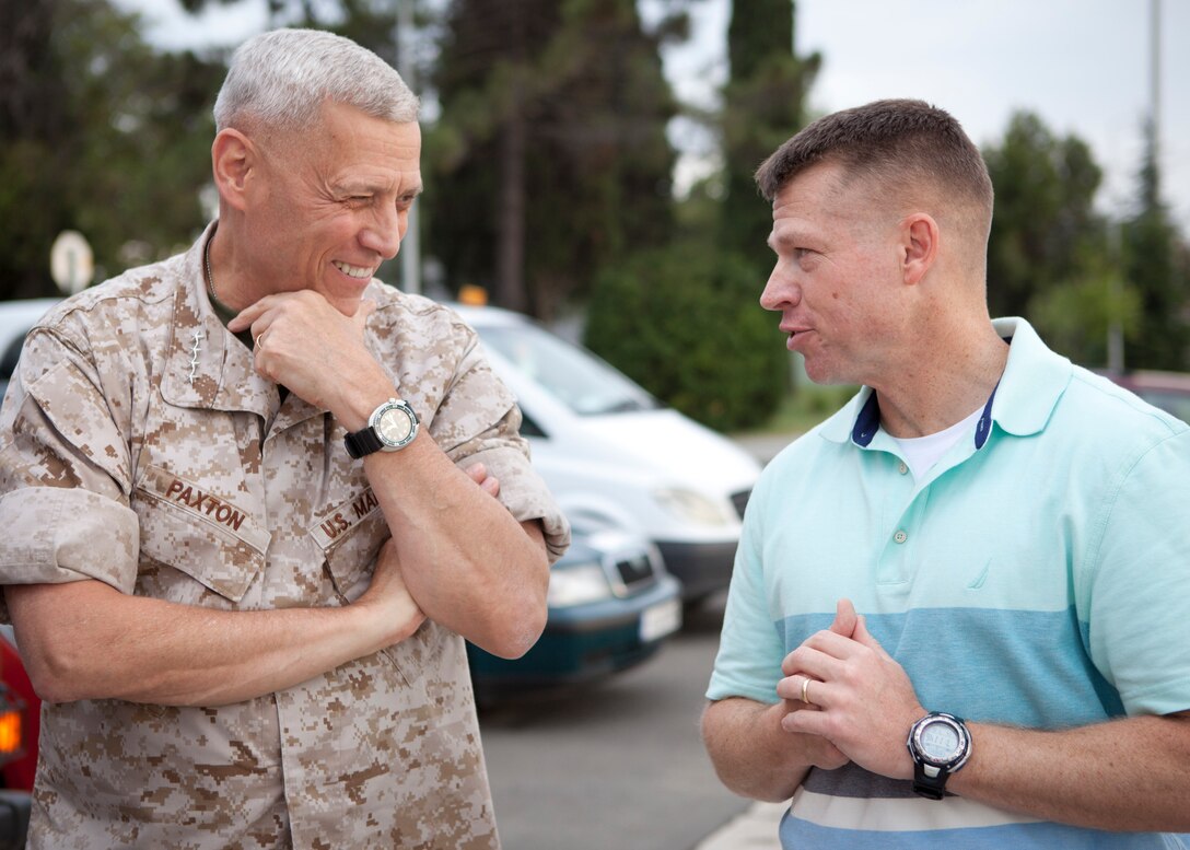 The Assistant Commandant of the Marine Corps, Gen. John M. Paxton, Jr., left, speaks with Lt. Col. Trevor Hall in Burgas, Bulgaria, July 15, 2014. (U.S. Marine Corps photo by Cpl. Tia Dufour/Released)